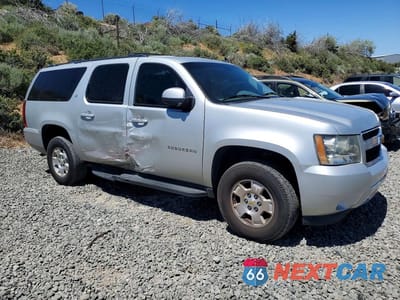 Czwarte zdjęcie samochodu z boku: 2011 CHEVROLET SUBURBAN K1500 LT VIN:1GNSKJE37BR262728 - miniatura