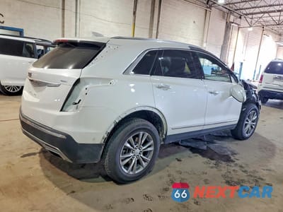 Trzecie zdjęcie samochodu z tyłu: 2022 CADILLAC XT5 PREMIUM LUXURY VIN:1GYKNDRS4NZ174107 - miniatura