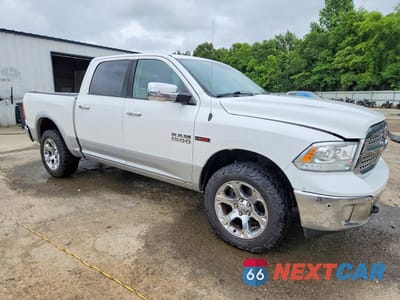 Czwarte zdjęcie samochodu z boku: 2014 RAM 1500 LARAMIE VIN:1C6RR7NMXES346495 - miniatura