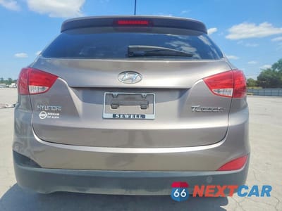 Zdjęcie 6 z 12 samochodu: 2012 HYUNDAI TUCSON GLS VIN:KM8JU3AC8CU424232 - miniatura