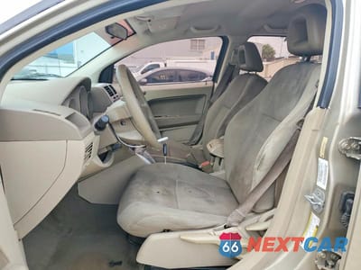 Zdjęcie 7 z 12 samochodu: 2009 DODGE CALIBER SXT VIN:1B3HB48A59D198387 - miniatura