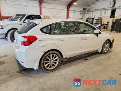 Trzecie zdjęcie samochodu z tyłu: 2012 SUBARU IMPREZA PREMIUM VIN:JF1GPAB69CH244050 - miniatura