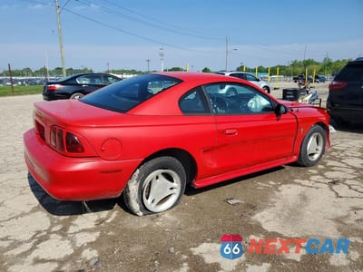 Trzecie zdjęcie samochodu z tyłu: 1997 FORD MUSTANG VIN:1FALP4044VF158550 - miniatura
