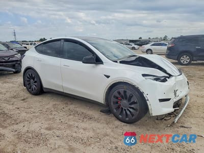 Czwarte zdjęcie samochodu z boku: 2022 TESLA MODEL Y VIN:7SAYGDEF4NF345479 - miniatura