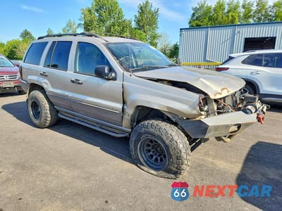 Czwarte zdjęcie samochodu z boku: 2004 JEEP GRAND CHEROKEE LAREDO VIN:1J4GW48S64C133922 - miniatura