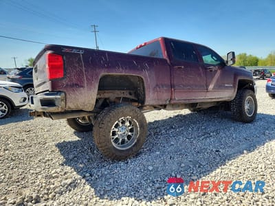 Trzecie zdjęcie samochodu z tyłu: 2017 CHEVROLET SILVERADO K2500 HEAVY DUTY LT VIN:1GC1KVEG4HF108826 - miniatura
