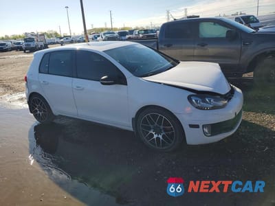 Czwarte zdjęcie samochodu z boku: 2014 VOLKSWAGEN GTI VIN:WVWHD7AJXEW006271 - miniatura