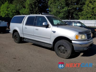 Czwarte zdjęcie samochodu z boku: 2001 FORD F150 SUPERCREW VIN:1FTRW08L61KC63202 - miniatura