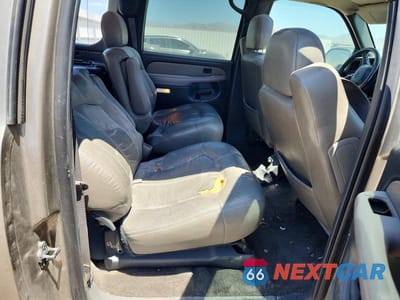 Zdjęcie 11 z 14 samochodu: 2002 CHEVROLET SUBURBAN C VIN:1GNEC16T02J238066 - miniatura