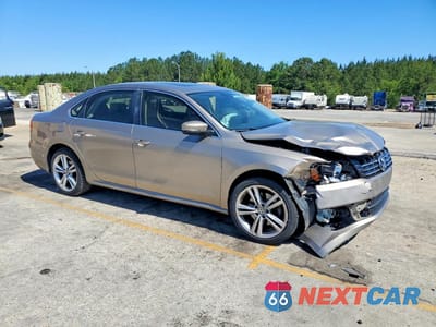 Czwarte zdjęcie samochodu z boku: 2015 VOLKSWAGEN PASSAT SE VIN:1VWBV7A33FC038743 - miniatura