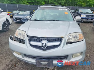 Piąte zdjęcie samochodu w środku: 2004 ACURA MDX VIN:2HNYD18234H561355 - miniatura