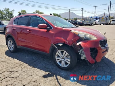 Czwarte zdjęcie samochodu z boku: 2019 KIA SPORTAGE LX VIN:KNDPM3AC6K7531484 - miniatura