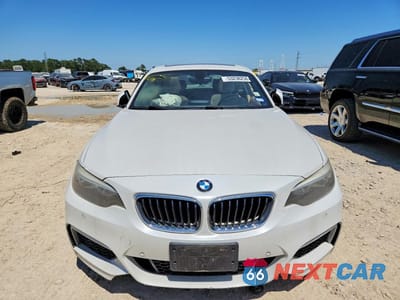 Piąte zdjęcie samochodu w środku: 2014 BMW 228 I VIN:WBA1F5C59EVV99348 - miniatura