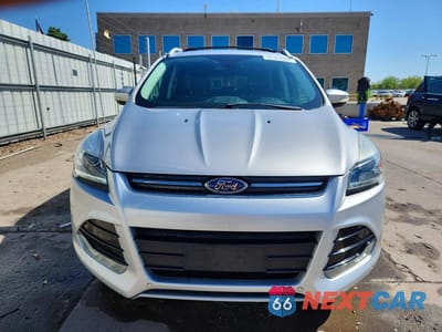 Piąte zdjęcie samochodu w środku: 2016 FORD ESCAPE TITANIUM VIN:1FMCU0J97GUC11838 - miniatura