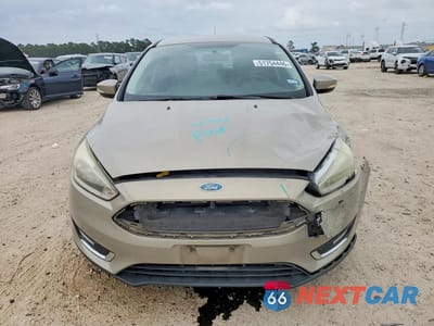 Piąte zdjęcie samochodu w środku: 2015 FORD FOCUS TITANIUM VIN:1FADP3N21FL268836 - miniatura