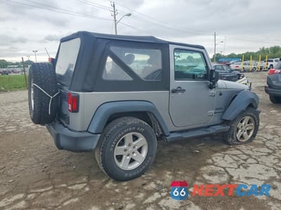 Trzecie zdjęcie samochodu z tyłu: 2016 JEEP WRANGLER SPORT VIN:1C4AJWAGXGL257496 - miniatura