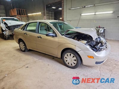 Czwarte zdjęcie samochodu z boku: 2006 FORD FOCUS ZX4 VIN:1FAFP34N56W107330 - miniatura