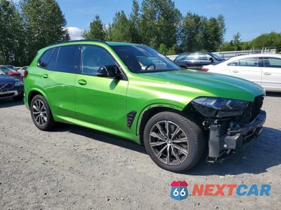 Czwarte zdjęcie samochodu z boku: 2024 BMW X5 M60I VIN:5UX33EU05R9U01899 - miniatura