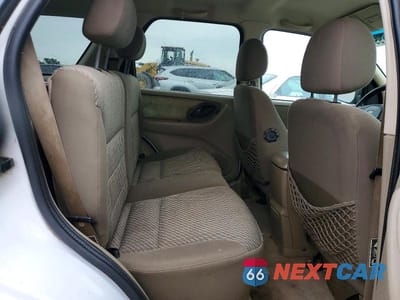 Zdjęcie 11 z 13 samochodu: 2003 FORD ESCAPE XLT VIN:1FMYU93103KA72837 - miniatura