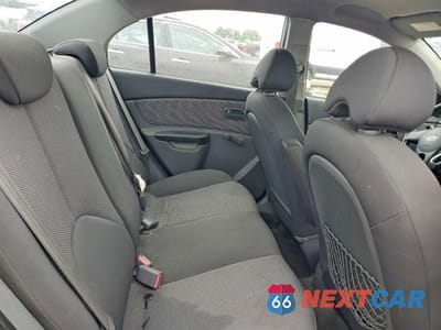 Zdjęcie 10 z 12 samochodu: 2010 KIA RIO BASE VIN:KNADH4A33A6680109 - miniatura