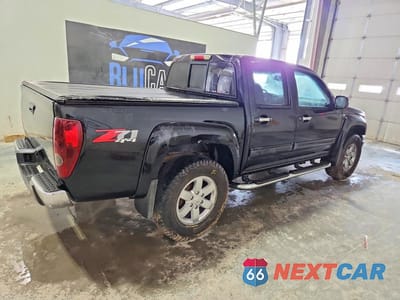 Trzecie zdjęcie samochodu z tyłu: 2011 CHEVROLET COLORADO LT VIN:1GCHTDFP9B8114959 - miniatura