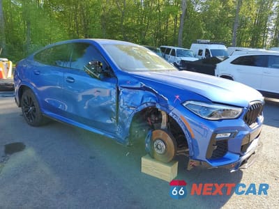Czwarte zdjęcie samochodu z boku: 2020 BMW X6 M50I VIN:5UXCY8C07L9B19603 - miniatura