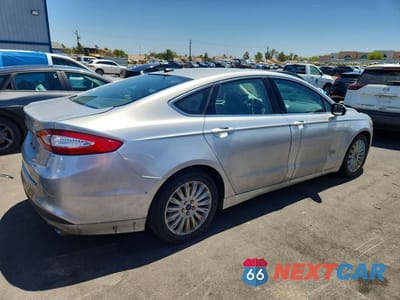 Trzecie zdjęcie samochodu z tyłu: 2016 FORD FUSION SE PHEV VIN:3FA6P0PU6GR211704 - miniatura