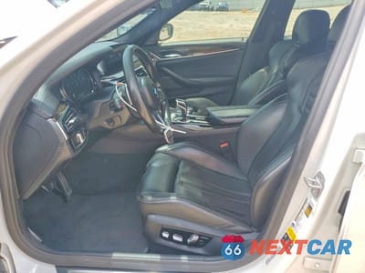 Zdjęcie 7 z 12 samochodu: 2018 BMW M5 VIN:WBSJF0C53JB283227 - miniatura