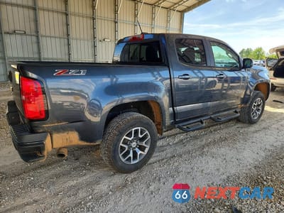 Trzecie zdjęcie samochodu z tyłu: 2016 CHEVROLET COLORADO Z71 VIN:1GCGTDE3XG1190099 - miniatura