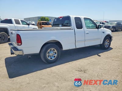 Trzecie zdjęcie samochodu z tyłu: 2002 FORD F150 VIN:1FTPX17L52NB15005 - miniatura