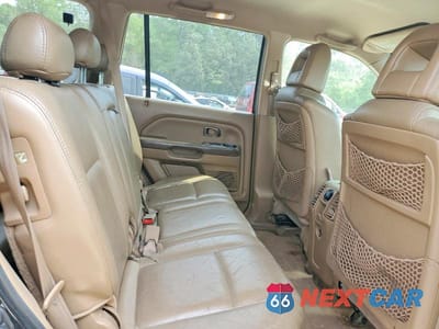 Zdjęcie 11 z 13 samochodu: 2004 HONDA PILOT EXL VIN:2HKYF18534H622088 - miniatura