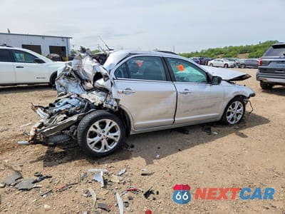 Trzecie zdjęcie samochodu z tyłu: 2012 FORD FUSION SE VIN:3FAHP0HA8CR319393 - miniatura