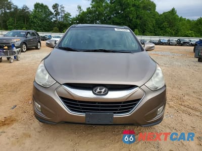 Piąte zdjęcie samochodu w środku: 2011 HYUNDAI TUCSON LIMITED VIN:KM8JU3AC4BU197992 - miniatura