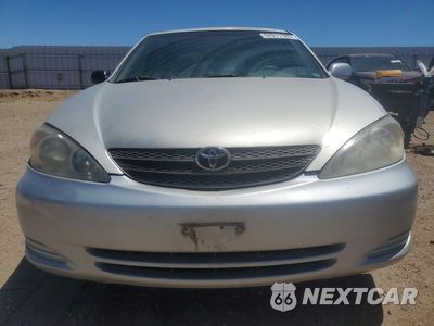 Piąte zdjęcie samochodu w środku: 2003 TOYOTA CAMRY LE VIN:JTDBE32K930167889 - miniatura