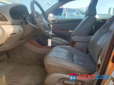 Zdjęcie 7 z 12 samochodu: 2002 TOYOTA CAMRY XLE V6 VIN:4T1BF30K42U503094 - miniatura