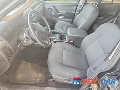 Zdjęcie 7 z 13 samochodu: 2004 JEEP GRAND CHEROKEE LAREDO VIN:1J4GW48S44C353639 - miniatura