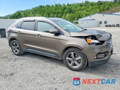 Czwarte zdjęcie samochodu z boku: 2019 FORD EDGE SEL VIN:2FMPK4J94KBC59603 - miniatura