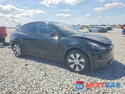 Czwarte zdjęcie samochodu z boku: 2023 TESLA MODEL Y VIN:7SAYGAEE3PF770202 - miniatura