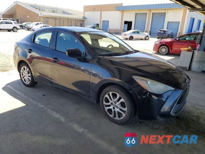 Czwarte zdjęcie samochodu z boku: 2016 SCION IA BASE VIN:3MYDLBZV2GY114022 - miniatura