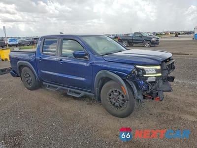 Czwarte zdjęcie samochodu z boku: 2023 NISSAN FRONTIER PRO-X VIN:1N6ED1EJ2PN635801 - miniatura