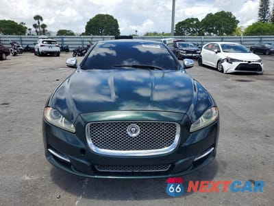 Piąte zdjęcie samochodu w środku: 2013 JAGUAR XJL PORTFOLIO VIN:SAJWA2GB5DLV40122 - miniatura
