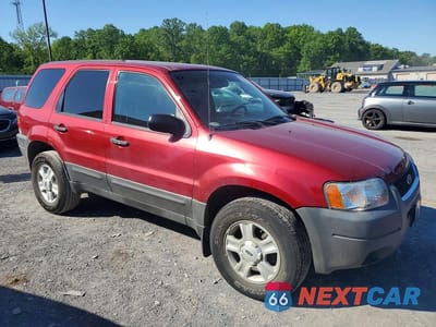 Czwarte zdjęcie samochodu z boku: 2003 FORD ESCAPE XLT VIN:1FMCU93103KC97561 - miniatura
