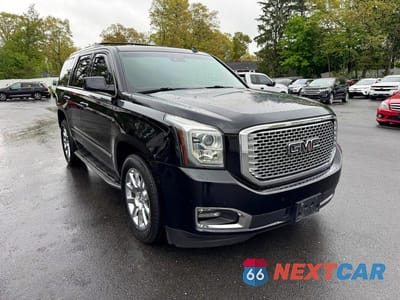 Czwarte zdjęcie samochodu z boku: 2015 GMC YUKON DENALI VIN:1GKS2CKJ1FR128914 - miniatura