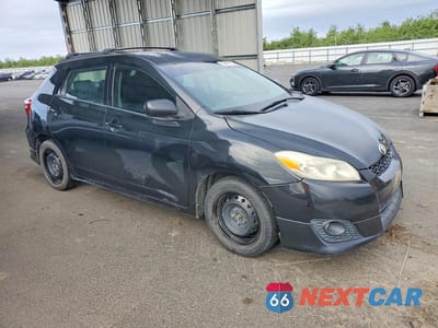 Czwarte zdjęcie samochodu z boku: 2009 TOYOTA COROLLA MATRIX S VIN:2T1KE40E69C024934 - miniatura