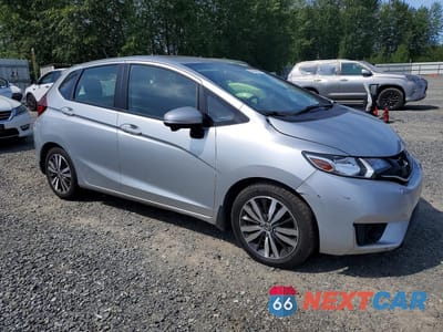 Czwarte zdjęcie samochodu z boku: 2016 HONDA FIT EX VIN:JHMGK5H72GX042127 - miniatura