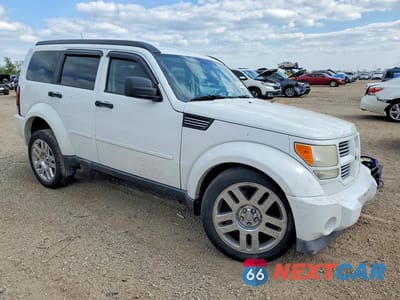 Czwarte zdjęcie samochodu z boku: 2011 DODGE NITRO HEAT VIN:1D4PT4GK8BW572862 - miniatura