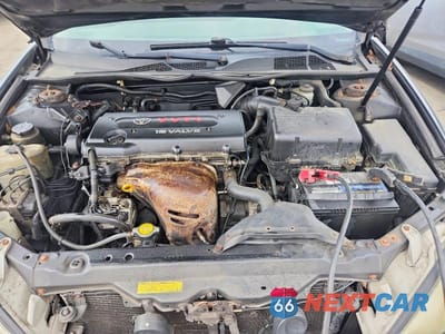 Zdjęcie 11 z 12 samochodu: 2003 TOYOTA CAMRY XLE VIN:4T1BE30KX3U152292 - miniatura