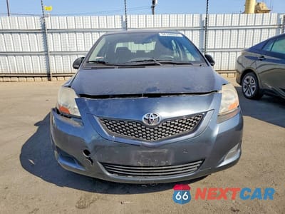 Piąte zdjęcie samochodu w środku: 2010 TOYOTA YARIS BASE VIN:JTDBT4K30A1392083 - miniatura