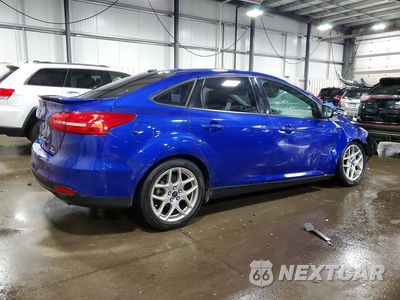 Trzecie zdjęcie samochodu z tyłu: 2015 FORD FOCUS SE VIN:1FADP3F22FL306329 - miniatura