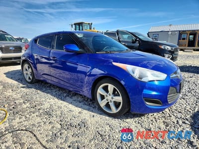 Czwarte zdjęcie samochodu z boku: 2014 HYUNDAI VELOSTER BASE VIN:KMHTC6ADXEU215079 - miniatura